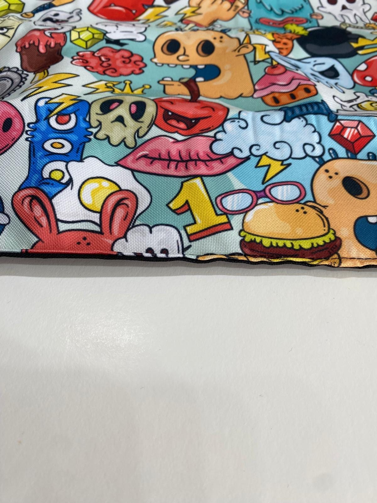 Detalle de la tela impermeable del cojín de gradas